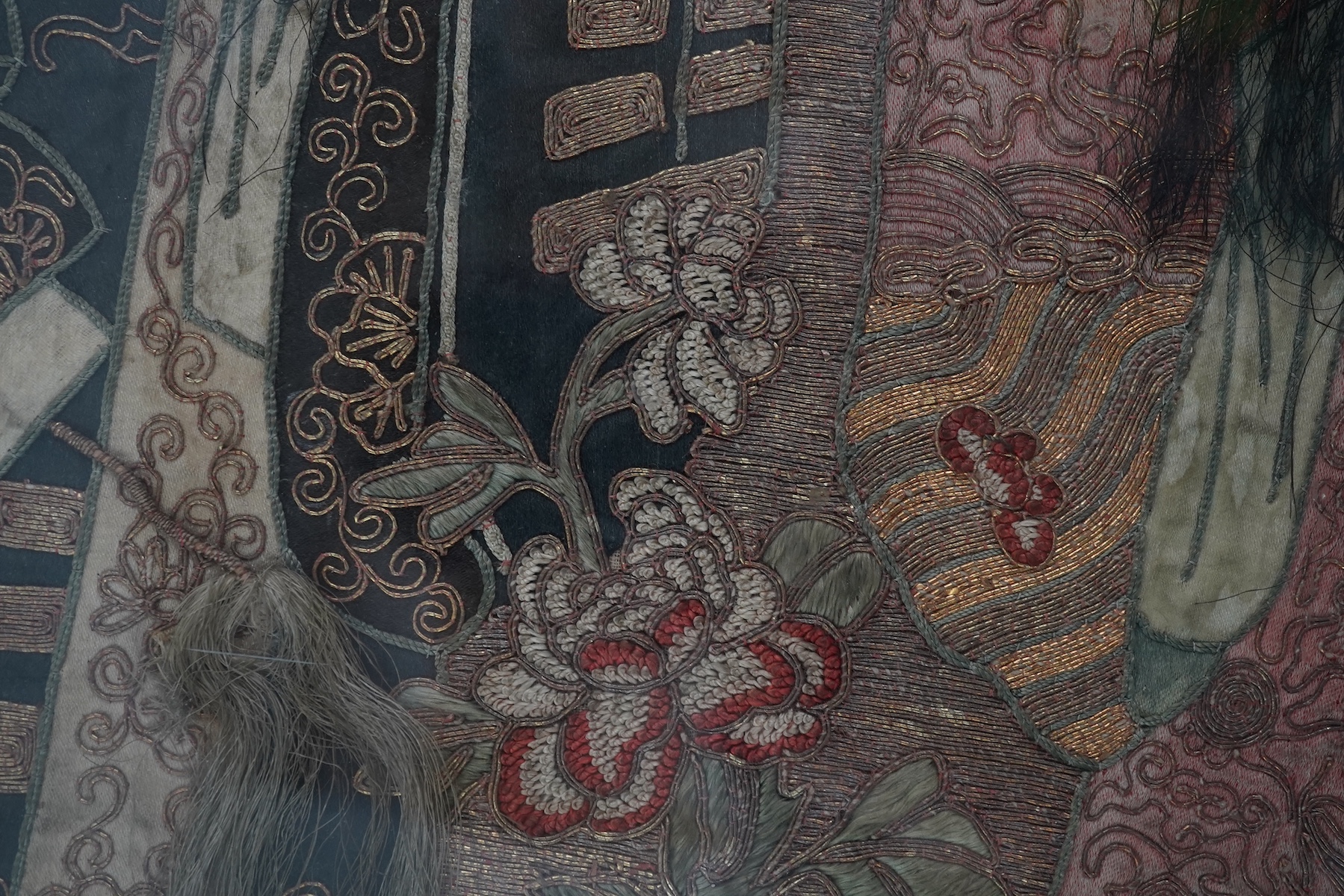 A Chinese embroidered silk ‘Peking Opera’ panel, early 20th century